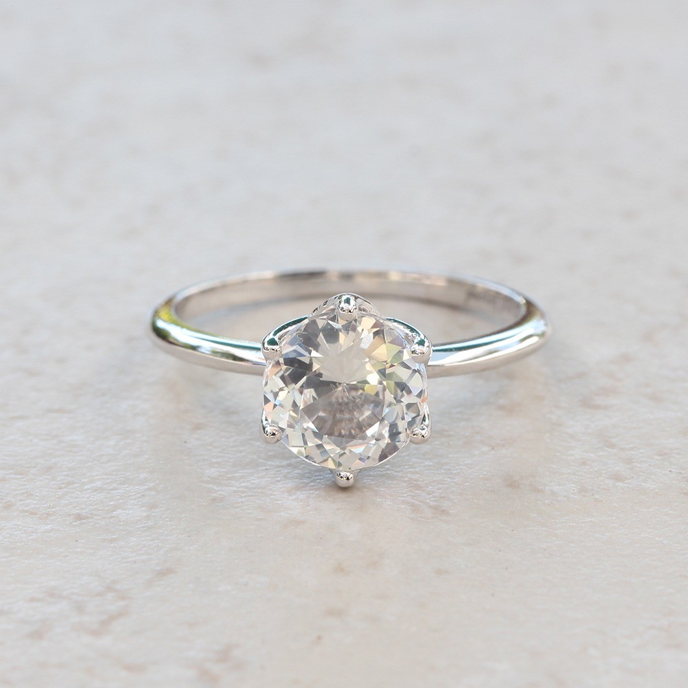 White-sapphire-engaement-solitaire-ring-in-18k-white-gold-by-Laurie-Sarah-LS5077-1