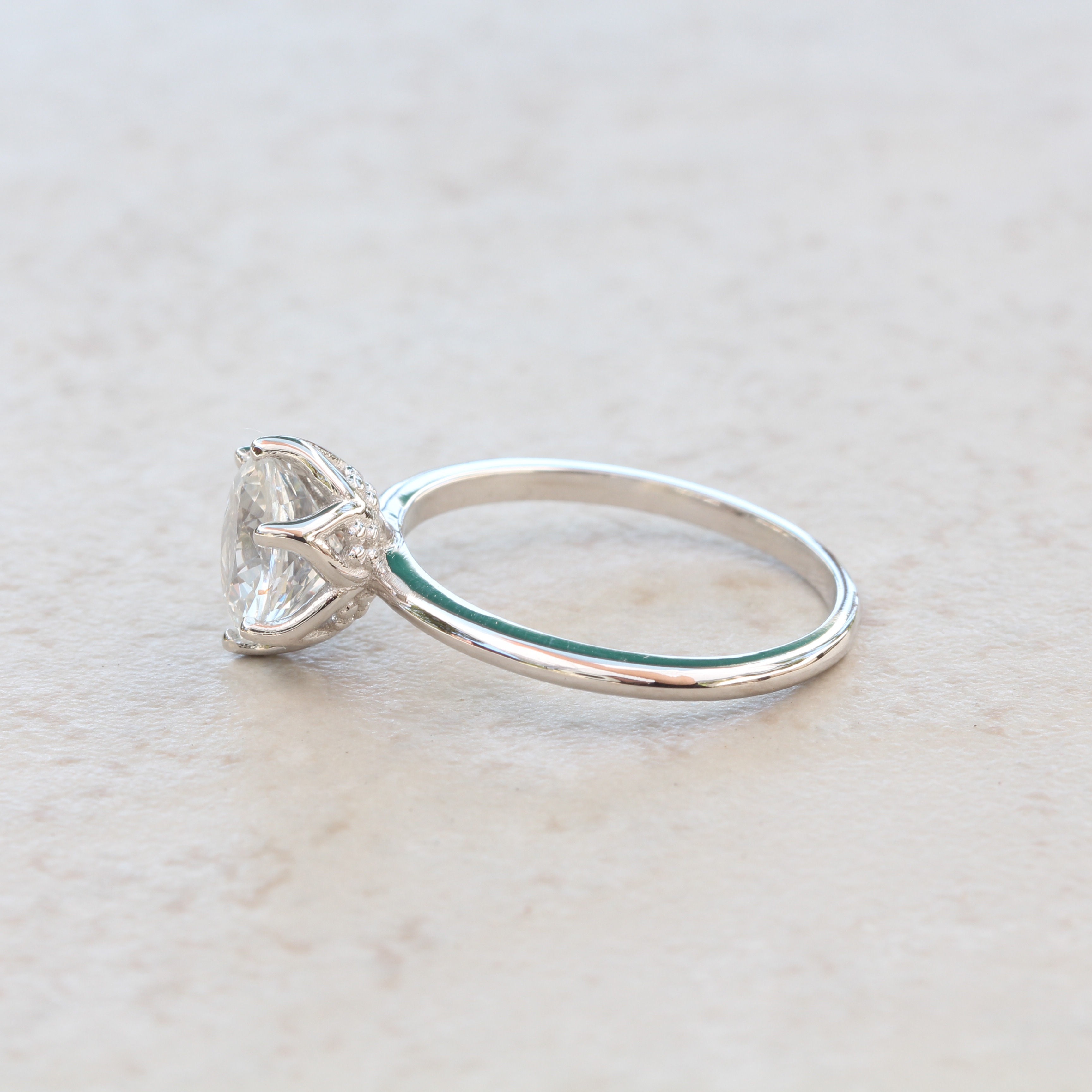 White-sapphire-engaement-solitaire-ring-in-18k-white-gold-by-Laurie-Sarah-LS5077-2